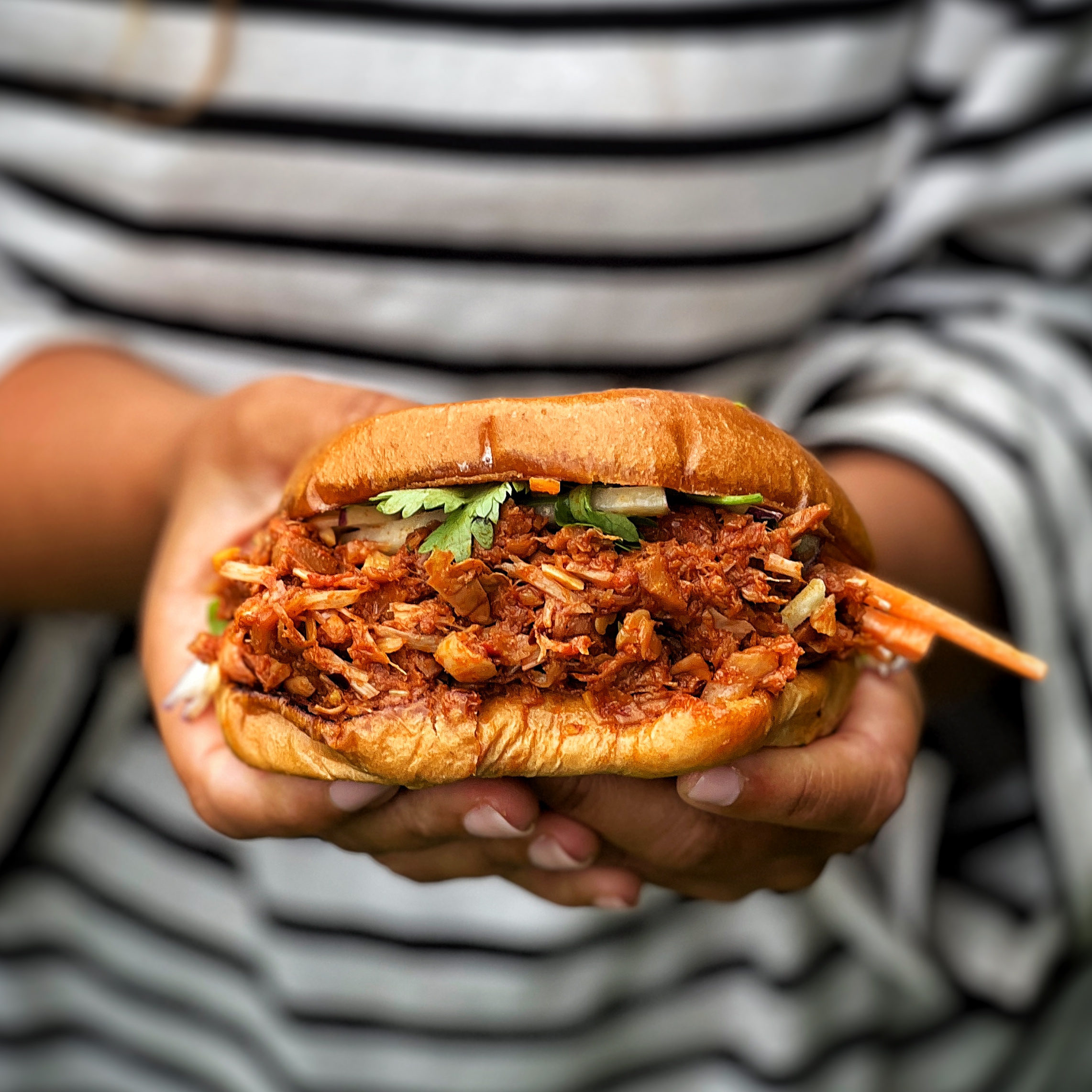 An image of Pulled Jack Fruit and Slaw Brioche Burgers